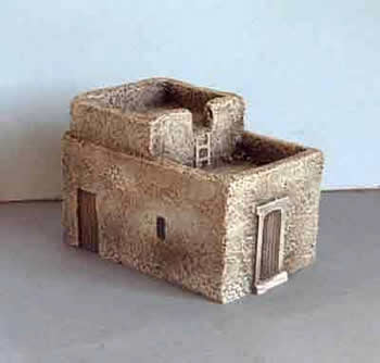 Oblong two storey house stairs to roof. (H31)